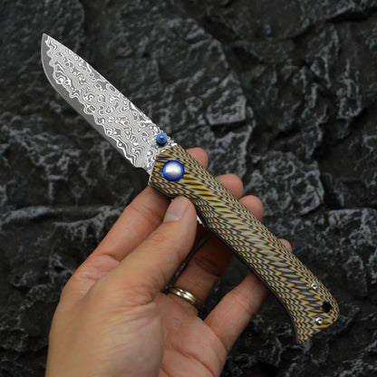 Damascus Folding Knife – Winged Avian with G10 Handle & Zirconium Inlay with 59HRC