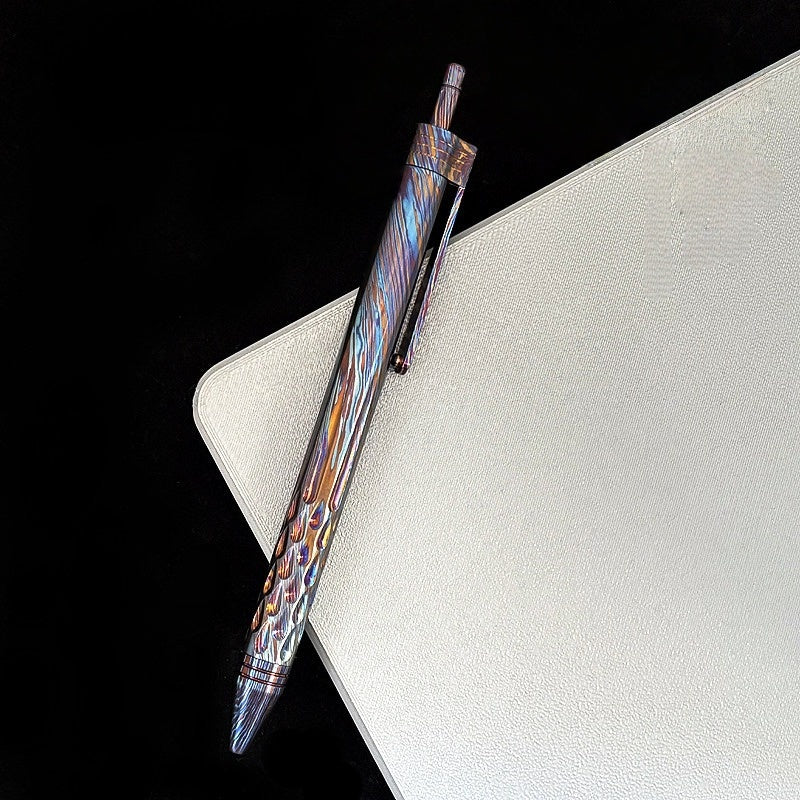 Damascus Tactical Pen – Titanium with CNC Engraved Titanium / Zirconium / Steel Writing